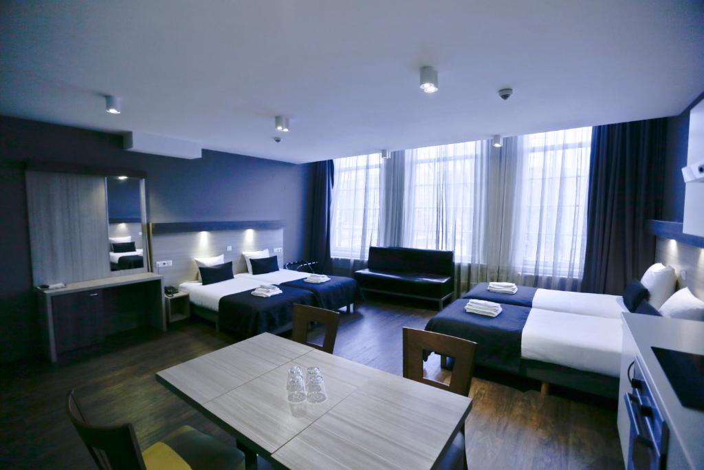 Четырехместный (Улучшенный четырехместный номер), City Hotel Amsterdam