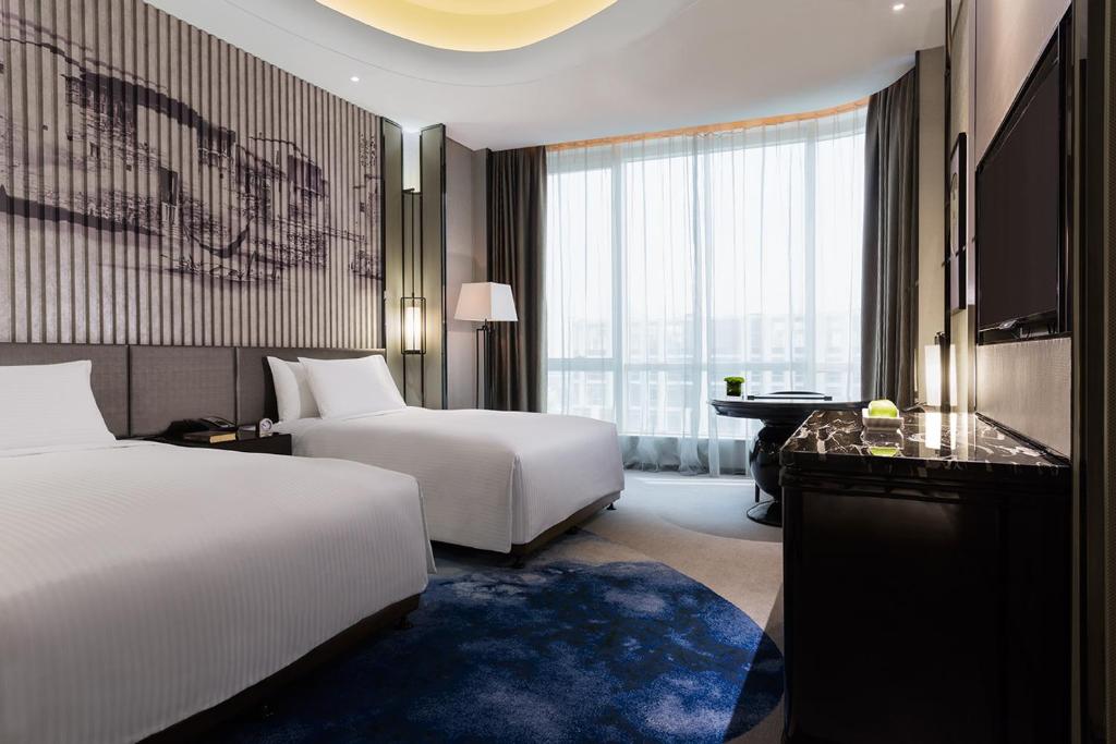 Двухместный (Двухместный номер Делюкс с 2 отдельными кроватями), Wanda Realm Hotel Wuhu
