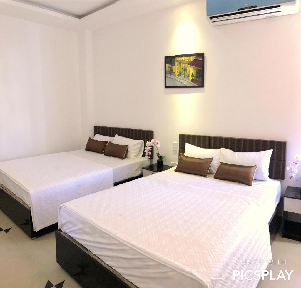Четырехместный (Номер Делюкс с 2 кроватями размера «queen-size»), Vien Dong Hotel