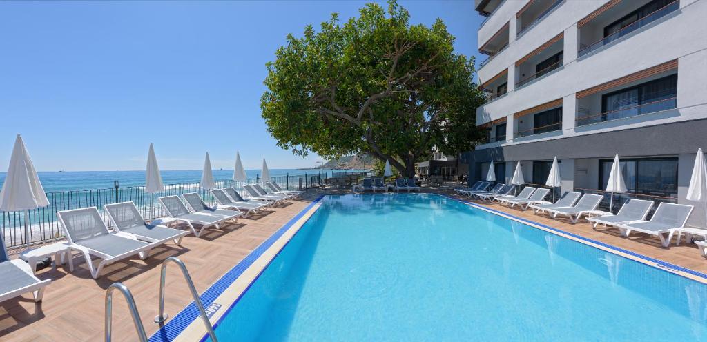 Floria Beach Hotel - Tap to explore photos