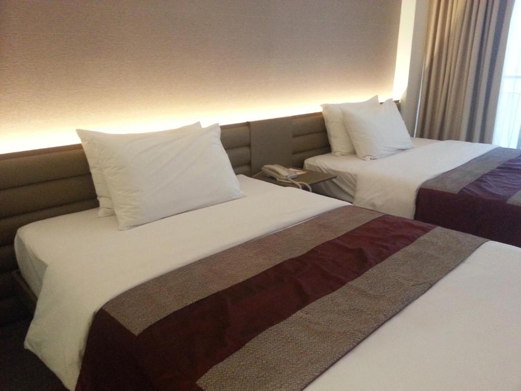 Двухместный (Двухместный номер Делюкс с 2 отдельными кроватями), The E-Hotel Makati