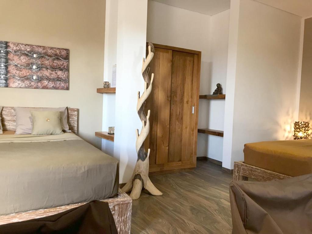 Двухместный (Номер Делюкс с кроватью размера «king-size» и балконом), Exotica Bali Villa Bed and Breakfast