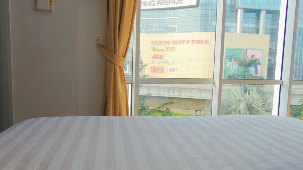Двухместный (Номер с кроватью размера «queen-size» и видом на сад), An Hotel Satrio Kuningan Jakarta