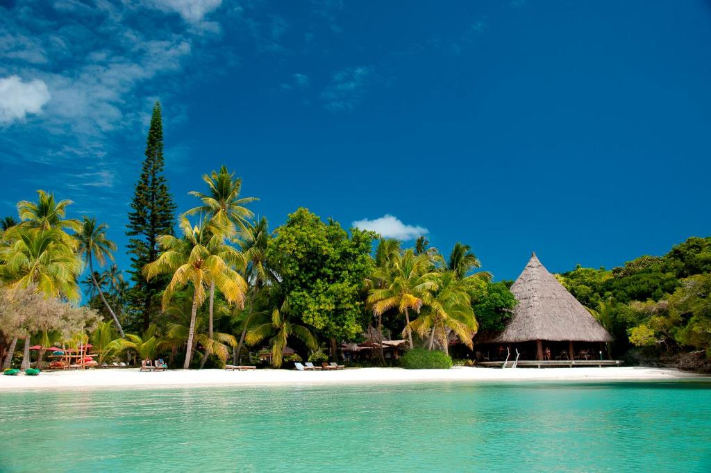 Oure Lodge Beach Resort - Tap to explore photos