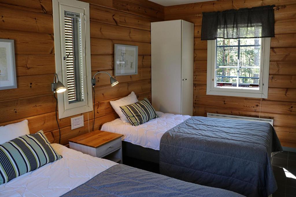 Номер (Вилла с двумя спальнями и сауной.), Rauhalahti Holiday Centre Villas