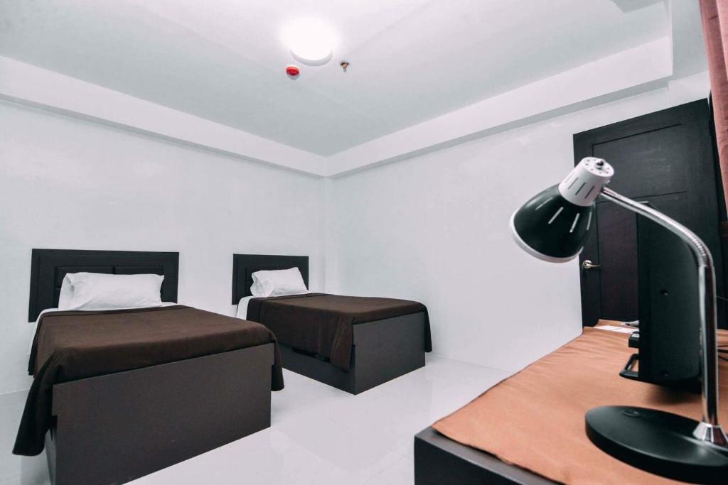 Студио (Двухместный номер-студио с 2 отдельными кроватями), The Strand Suites and Dormitel