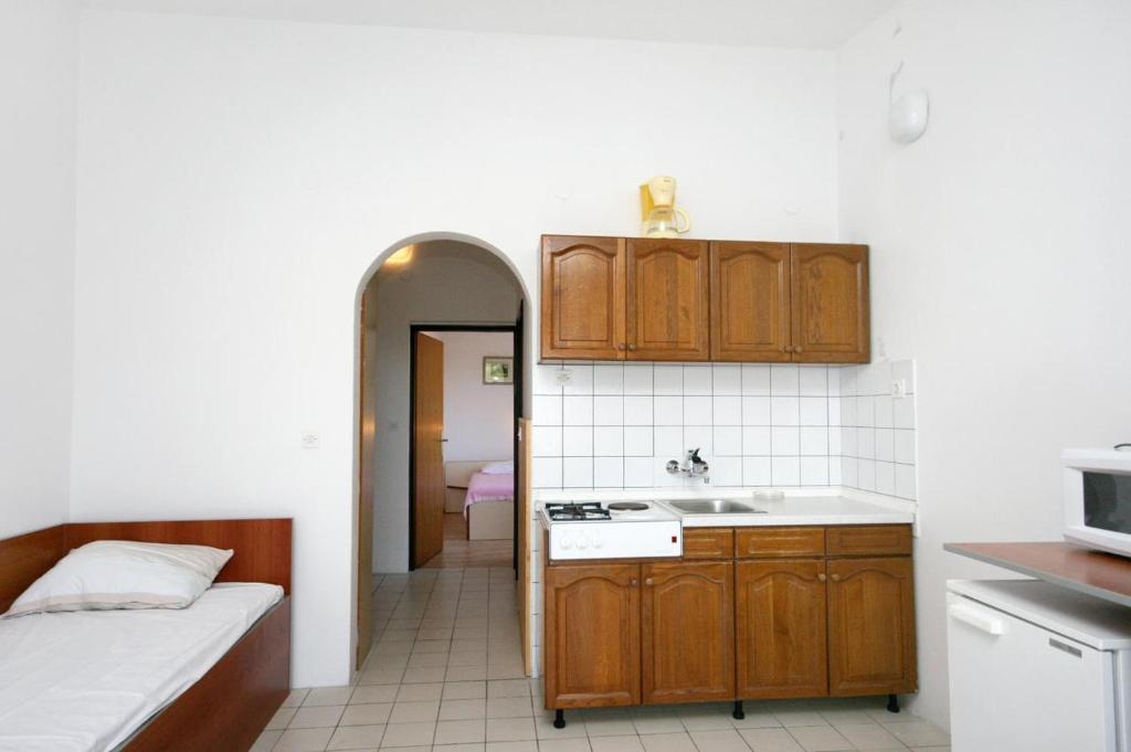 Апартаменты (Апартаменты с 1 спальней, террасой и видом на море), Seaside apartments with a swimming pool Potocnica (Pag) - 6407