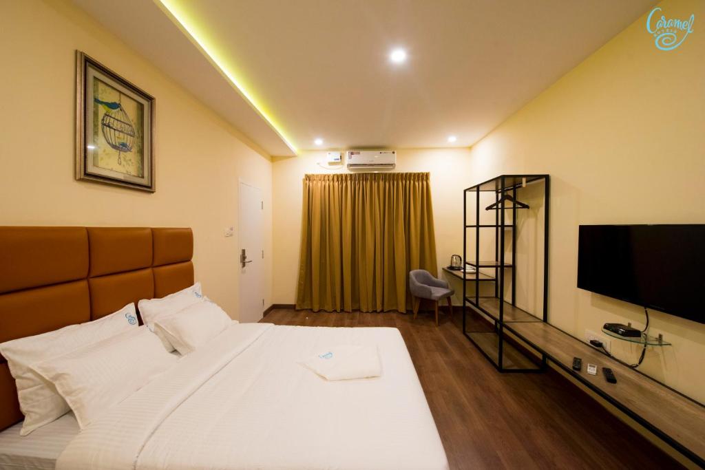 Двухместный (Улучшенный двухместный номер с 1 кроватью), Caramel Hotels