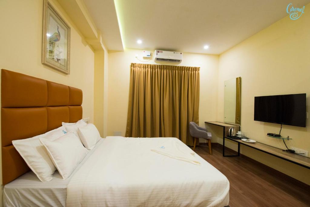 Двухместный (Улучшенный двухместный номер с 1 кроватью), Caramel Hotels