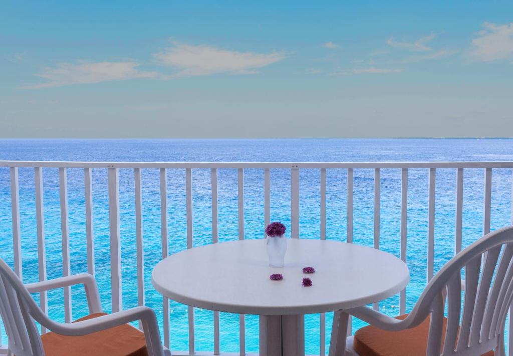 Coral Princess Hotel & Dive Resort - Tap to explore photos