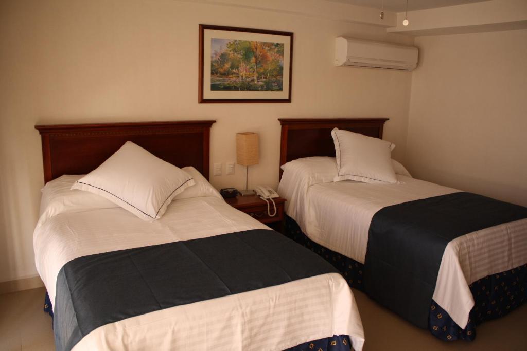 Двухместный (Двухместный номер с 2 двуспальными кроватями), Hotel Porto Allegro Puerto Vallarta