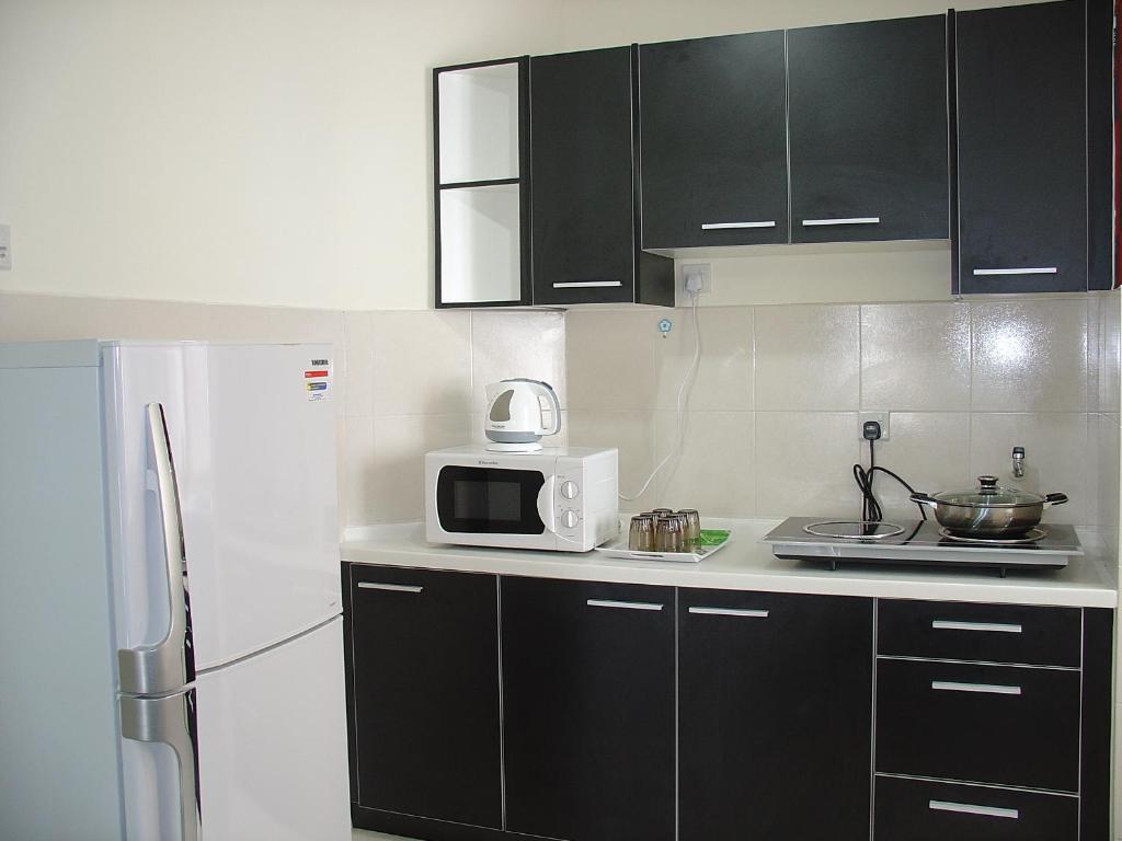 Апартаменты (Апартаменты Делюкс с 3 спальнями), Duta Hotel & Residence