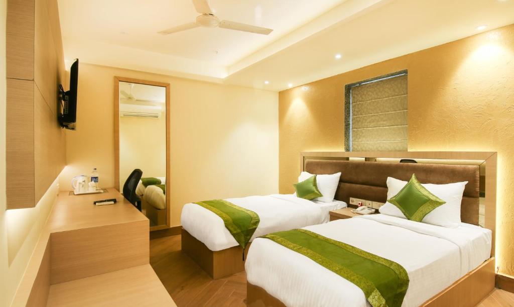 Двухместный ([Sanitized] Deluxe Double or Twin Room), Treebo Hoops