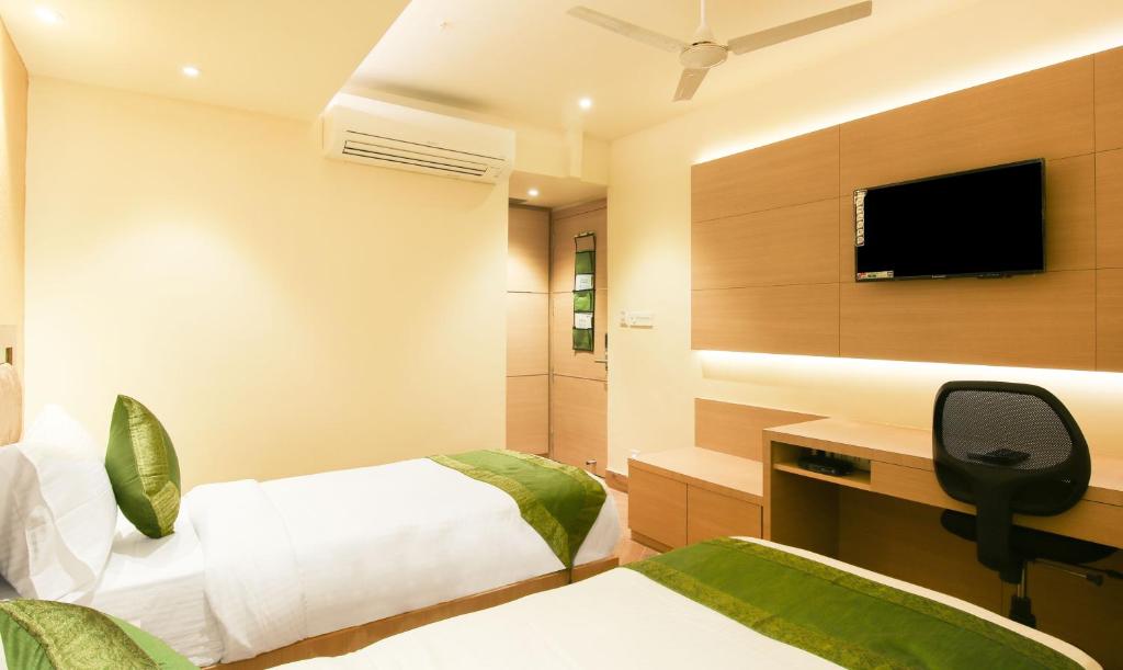 Двухместный ([Sanitized] Deluxe Double or Twin Room), Treebo Hoops