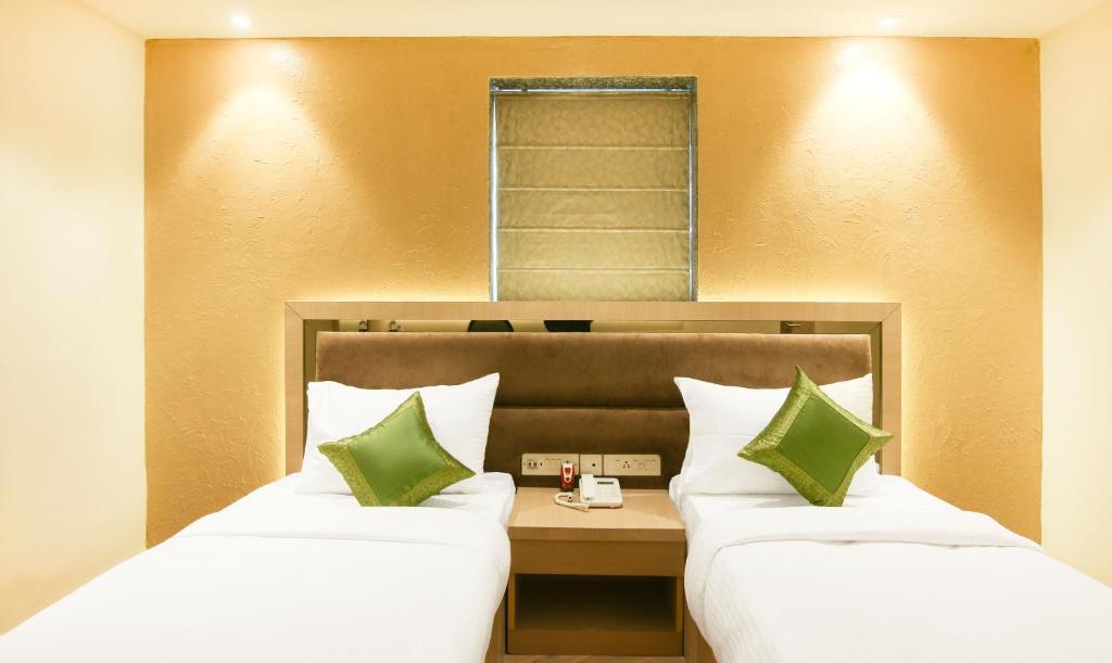 Двухместный ([Sanitized] Deluxe Double or Twin Room), Treebo Hoops