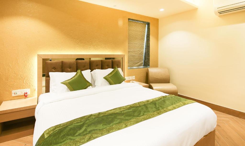 Двухместный ([Sanitized] Deluxe Double or Twin Room), Treebo Hoops