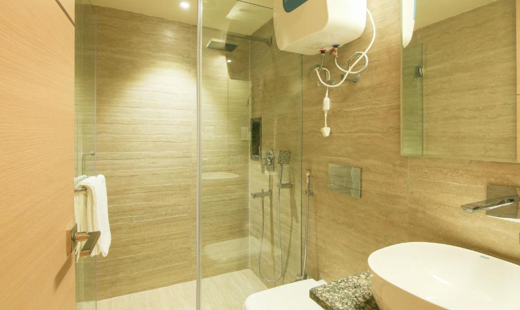 Двухместный ([Sanitized] Deluxe Double or Twin Room), Treebo Hoops