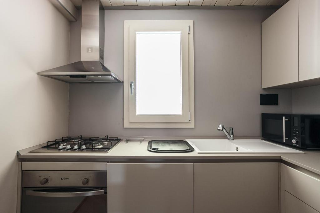Sant'orsola Suites Apartments - Tap to explore photos