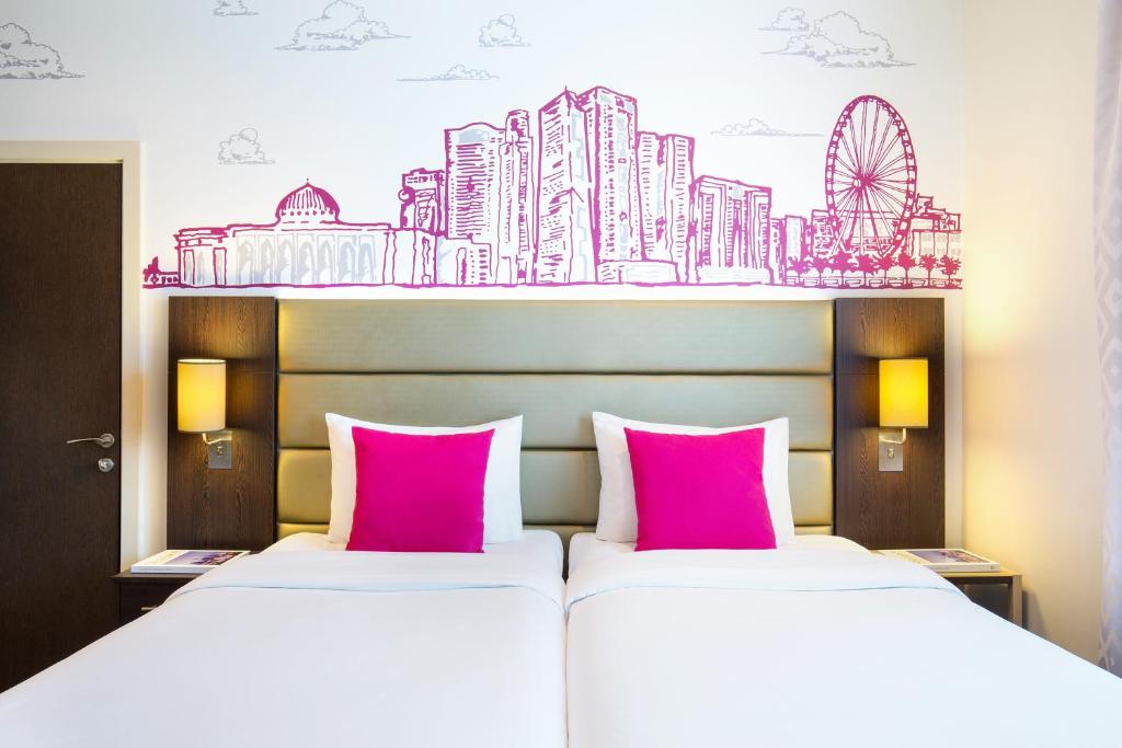 Ibis Styles Sharjah  - Tap to explore photos