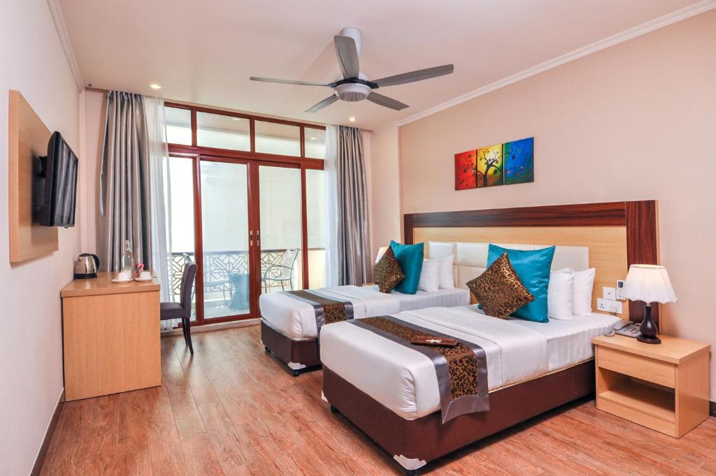 Двухместный (Двухместный номер Делюкс с 1 кроватью или 2 отдельными кроватями и видом на бассейн), Гостевой дом Triton Beach Hotel & Spa