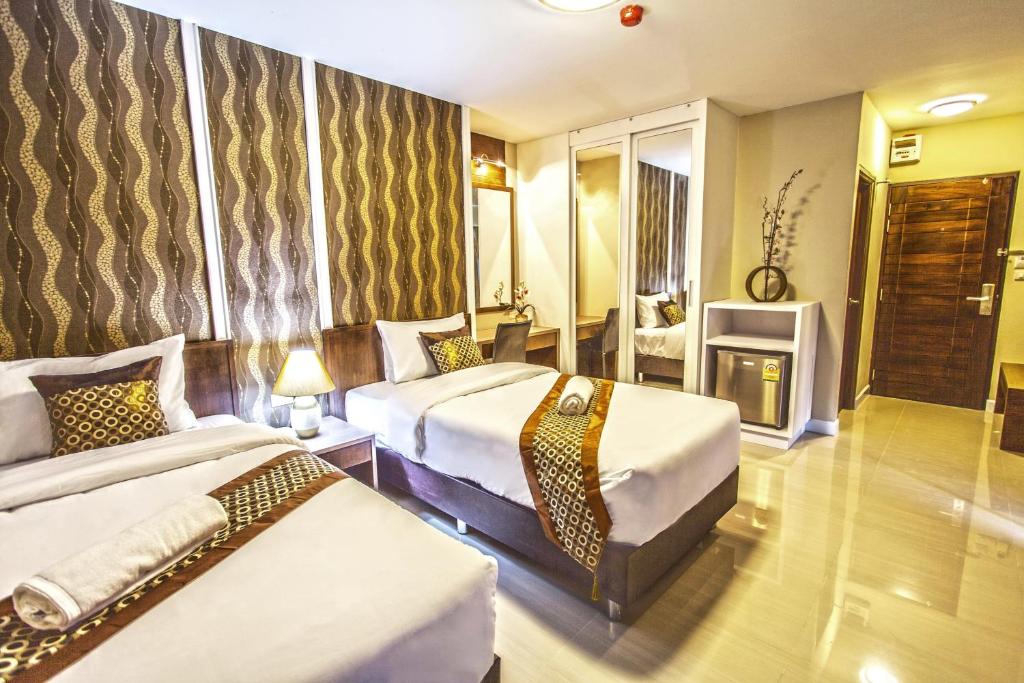Двухместный (Двухместный номер Делюкс с 2 отдельными кроватями), The Aim Sathorn Hotel