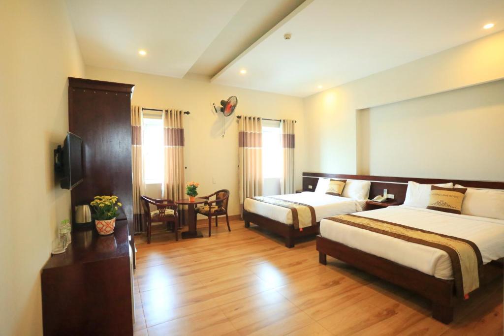 Phuong Linh Hotel - Tap to explore photos