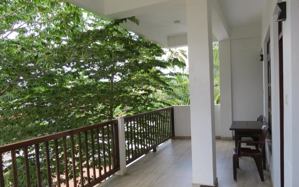 Двухместный (Двухместный номер Делюкс с 1 кроватью или 2 отдельными кроватями и балконом), Sailors Mirissa