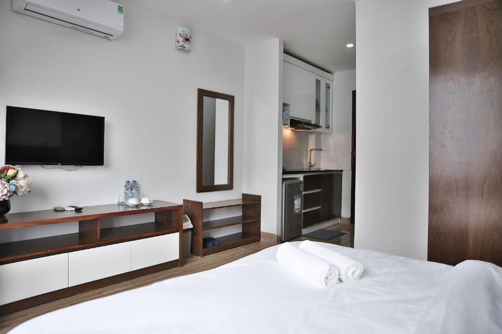 V House 6 Serviced Apartment - Tap to explore photos