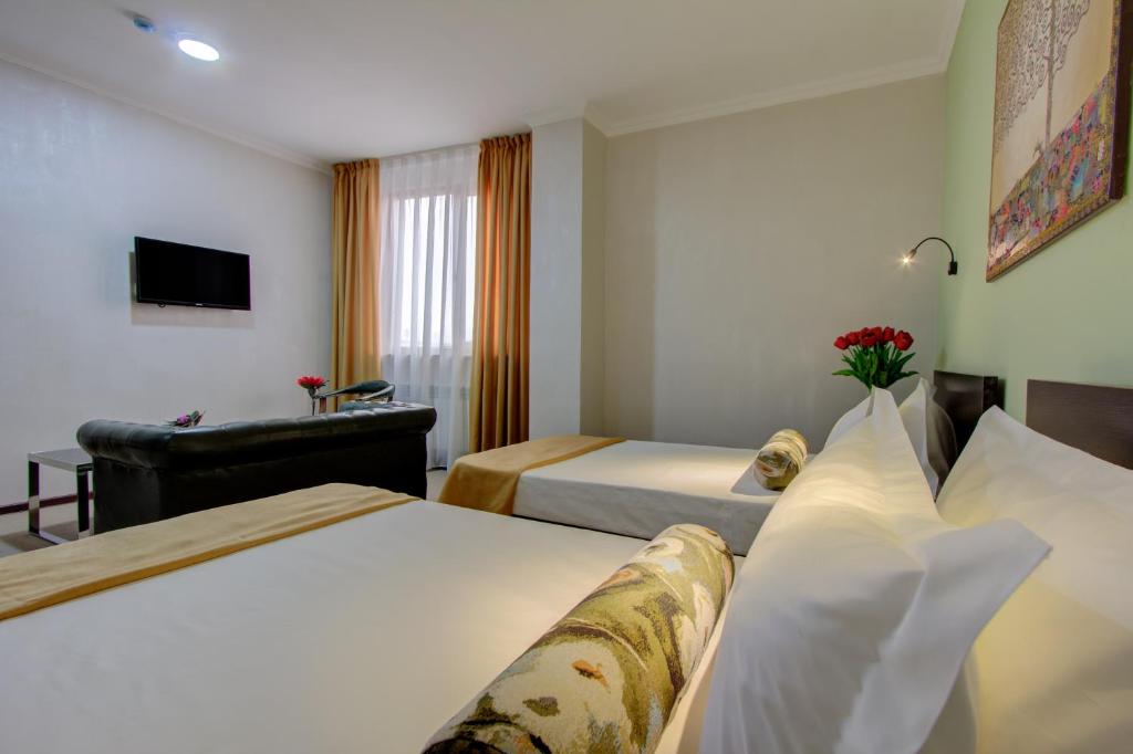 Olive Hotel Bishkek - Tap to explore photos