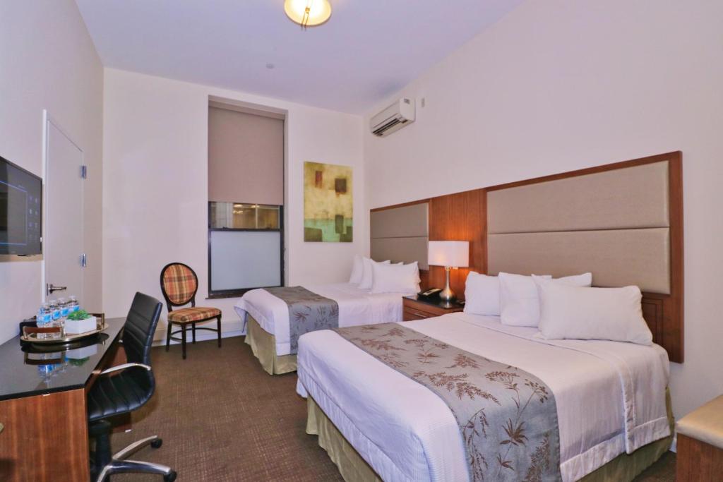 Четырехместный (Четырехместный номер с собственной ванной комнатой), Americana Inn