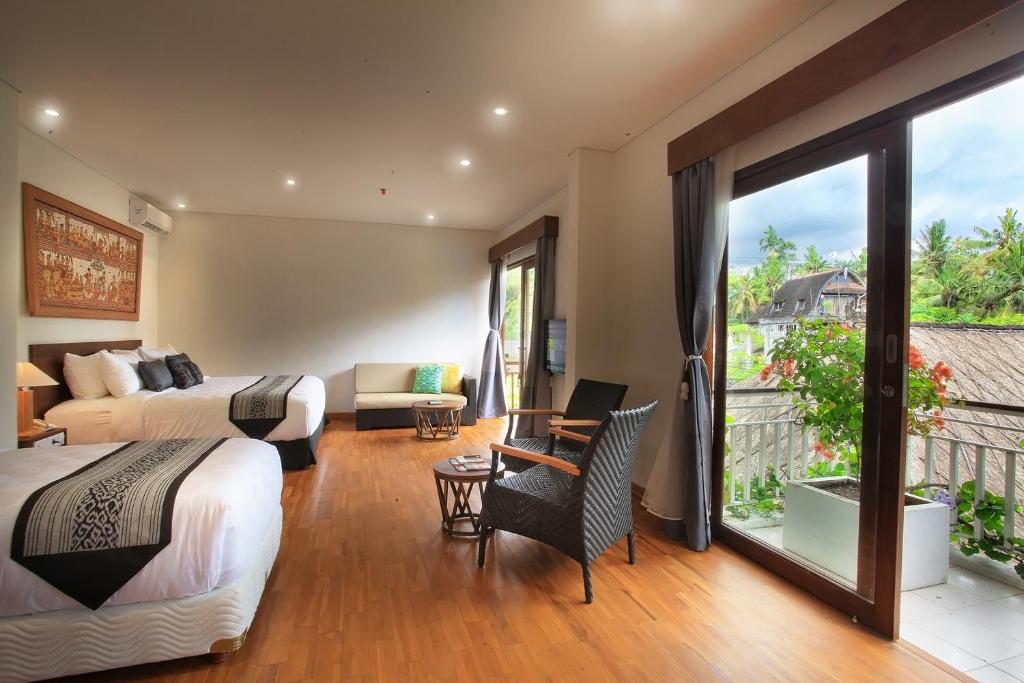 Семейный (Семейные апартаменты с балконом и видом на бассейн), Hotel Puriartha Ubud