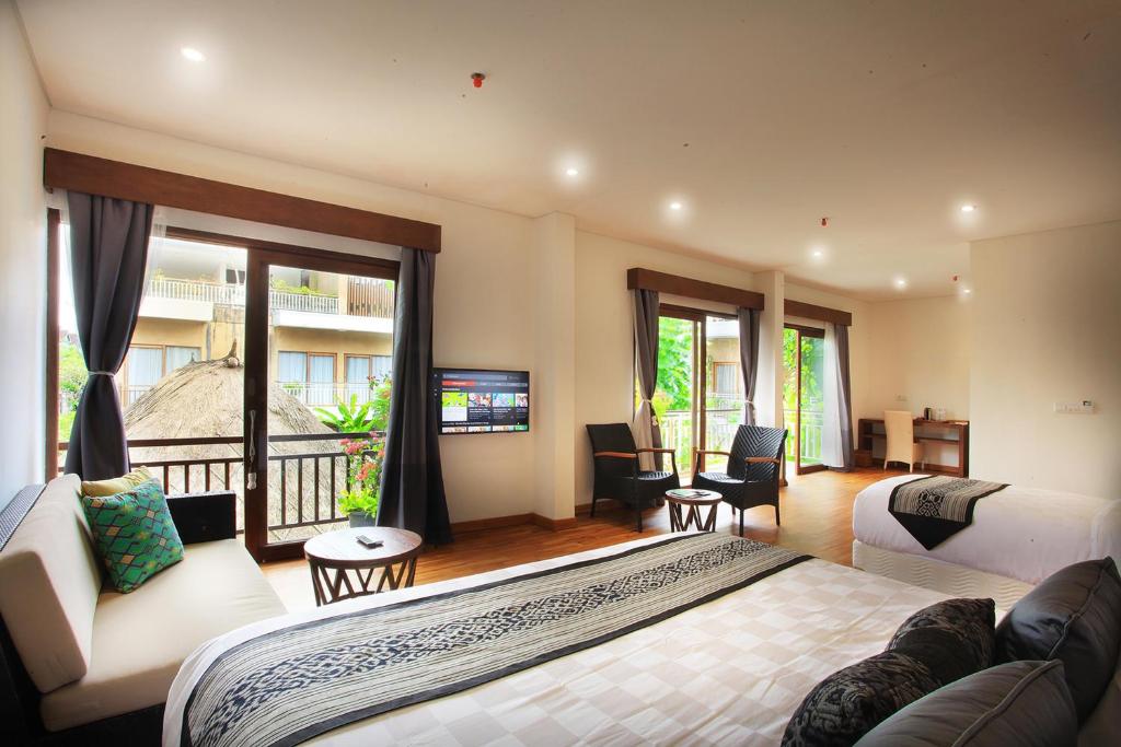 Семейный (Семейные апартаменты с балконом и видом на бассейн), Hotel Puriartha Ubud