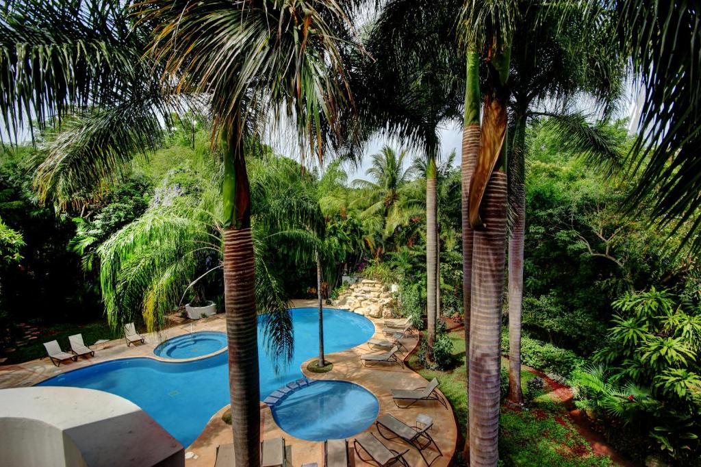 Апартаменты (Апартаменты Palmar с 3 спальнями, вид на сад), Riviera Maya Suites