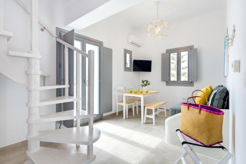 White Harmony Suites - Tap to explore photos