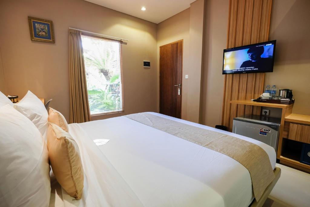 Двухместный (Двухместный номер Делюкс с 1 кроватью), Puri Padma Hotel