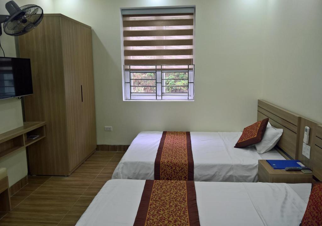 Двухместный (Двухместный номер с 2 отдельными кроватями и окном), Cat Ba Green Hotel