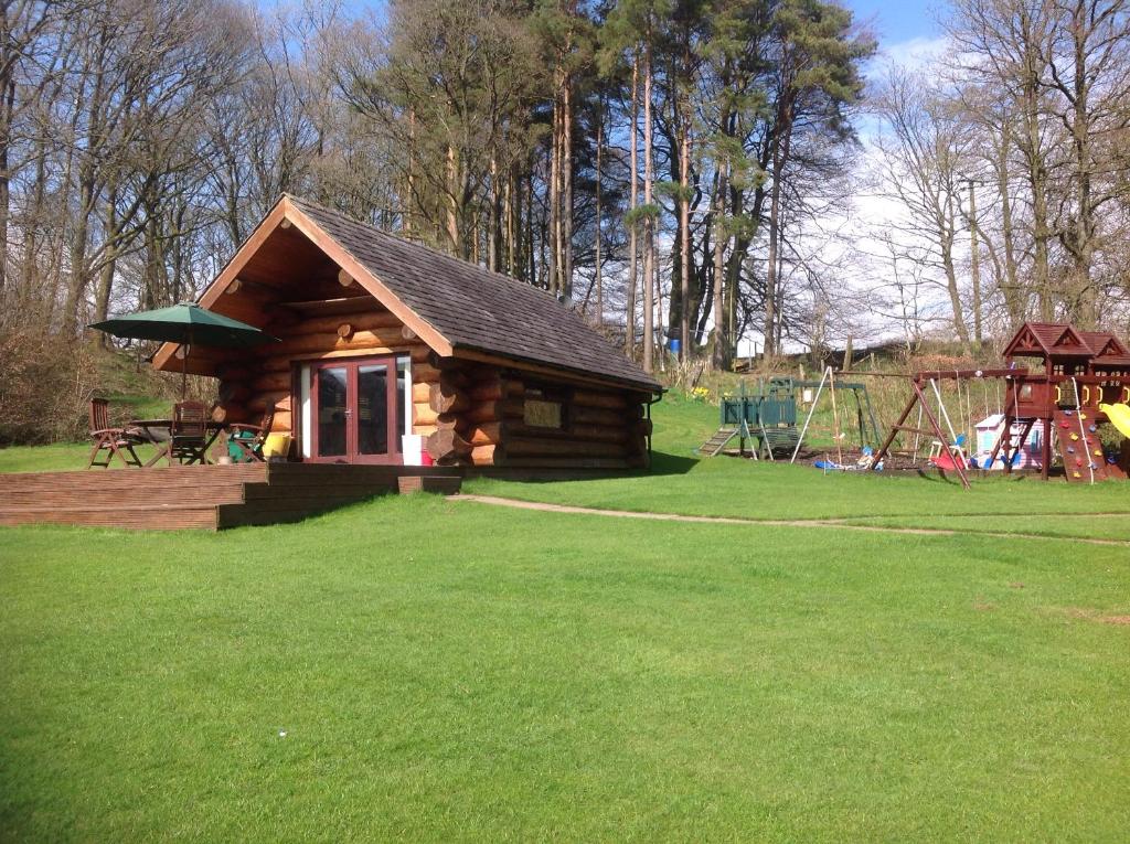 lyne view, log cabin - Tap to explore photos