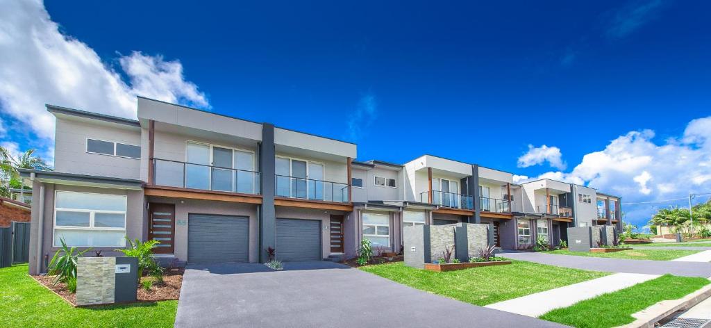 Escape At Nobbys Executive Townhouse 1 74 Pacific Drive photo 1