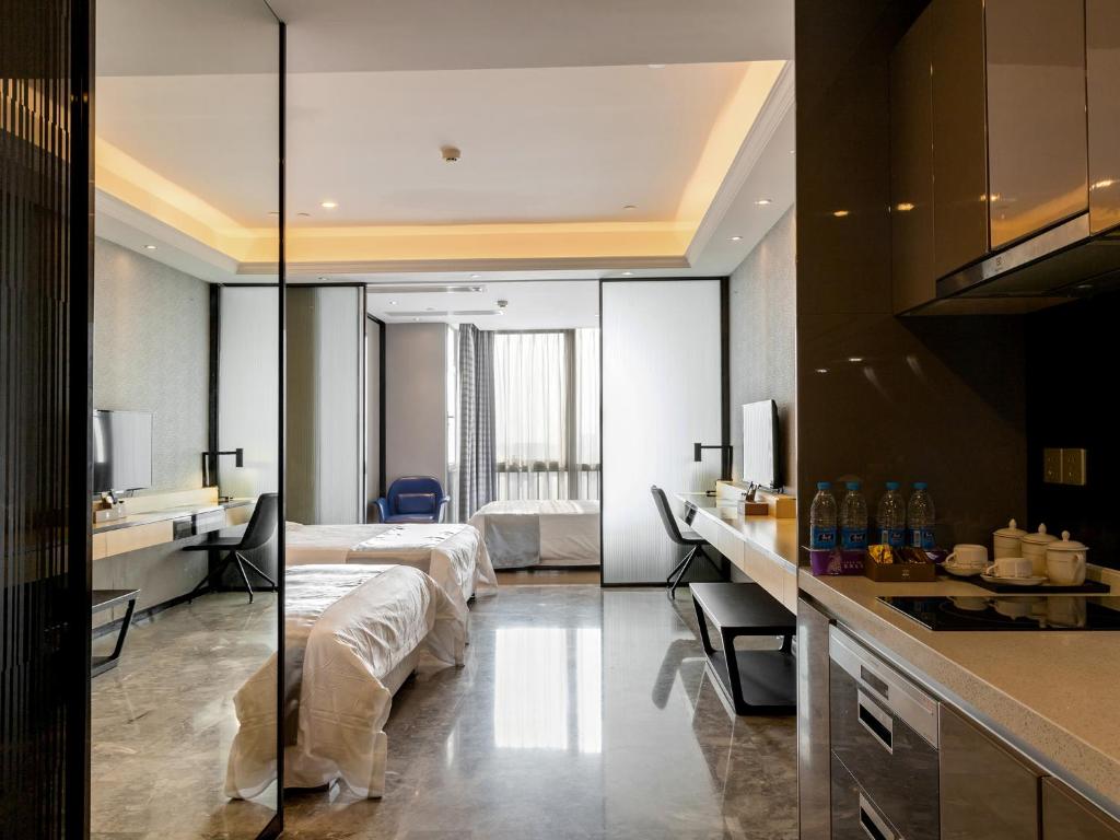 Трехместный (Трехместный номер Делюкс с видом на город), Boman Holiday Apartment Jie Deng Du Hui Branch