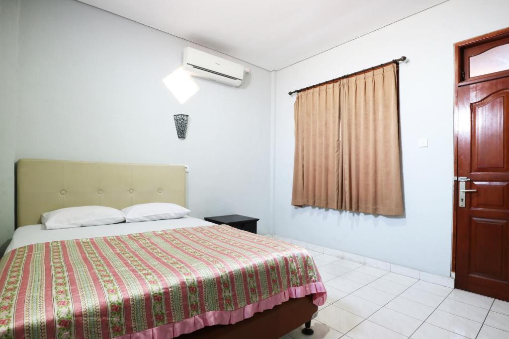 Двухместный (Стандартный двухместный номер с 1 кроватью), Taman Mekar Beach Inn Kuta