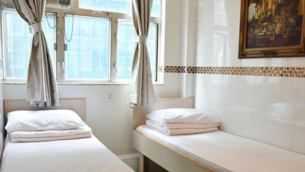 Двухместный (Двухместный номер Делюкс с 2 отдельными кроватями), Happy land guesthouse