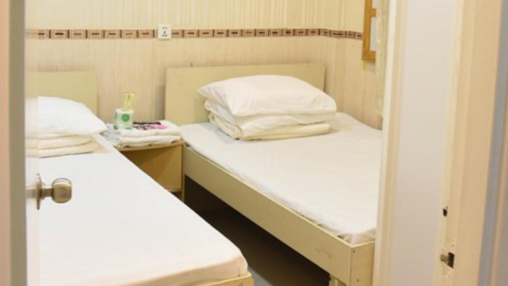Двухместный (Двухместный номер Делюкс с 2 отдельными кроватями), Happy land guesthouse