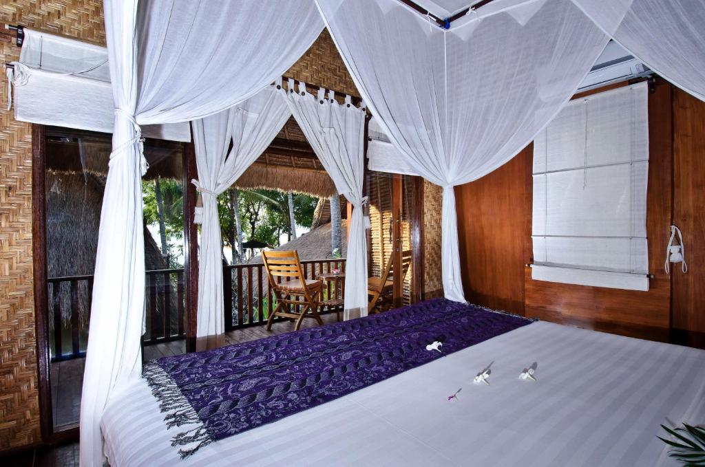 Lumbung Bali Huts - Tap to explore photos