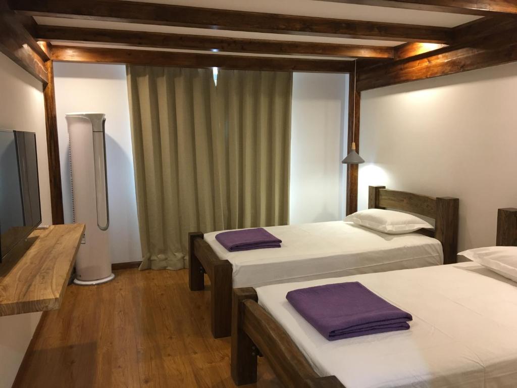 Двухместный (Двухместный номер Делюкс с 2 отдельными кроватями), Beijing Downtown Backpackers Accommodation