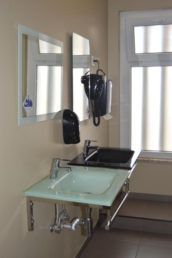 Двухместный (Стандартный двухместный номер с 1 кроватью или 2 отдельными кроватями, балконом и общей ванной комнатой), Wallis Rato