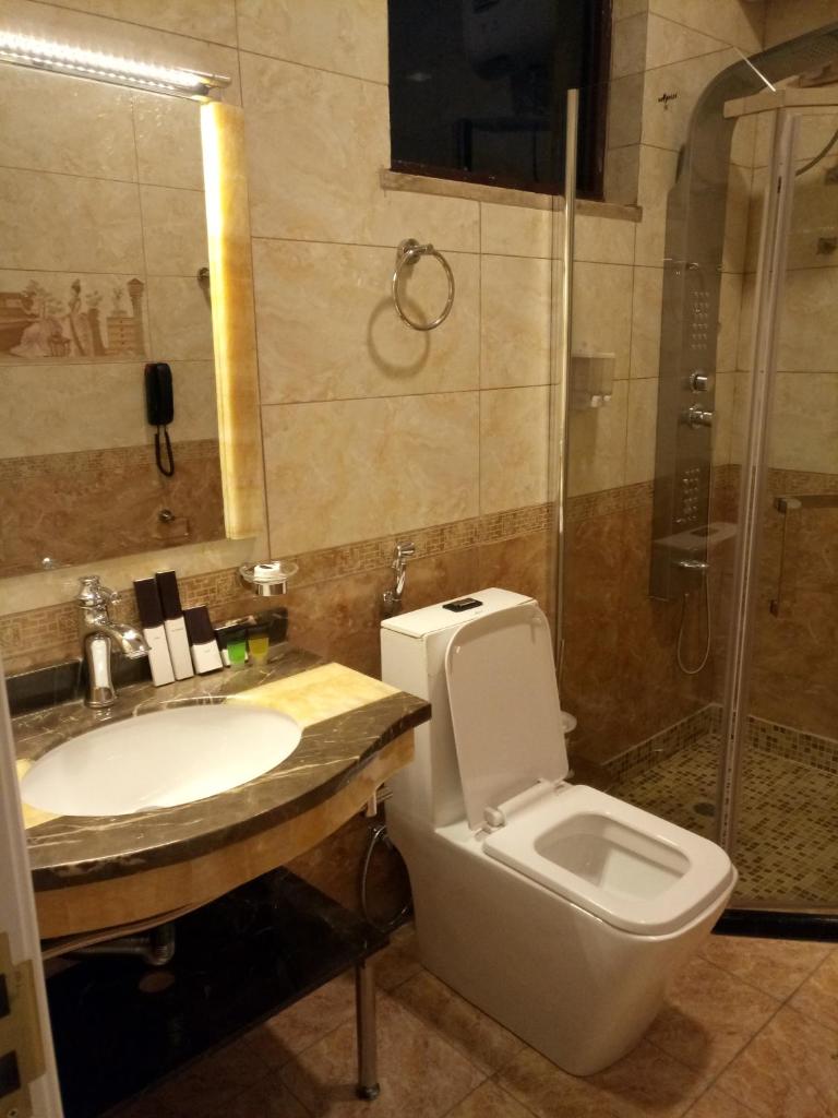 Sherar Addis Hotel - Tap to explore photos