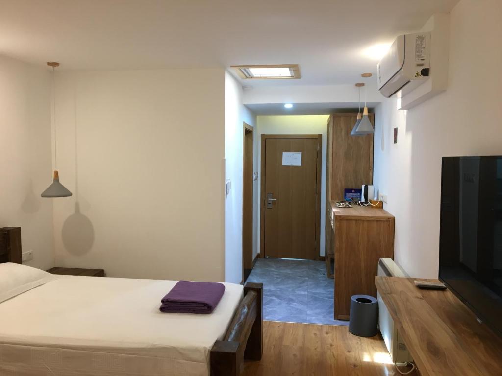 Двухместный (Двухместный номер Делюкс с 2 отдельными кроватями), Beijing Downtown Backpackers Accommodation