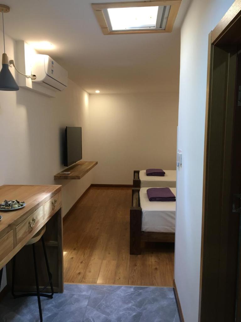 Двухместный (Двухместный номер Делюкс с 2 отдельными кроватями), Beijing Downtown Backpackers Accommodation