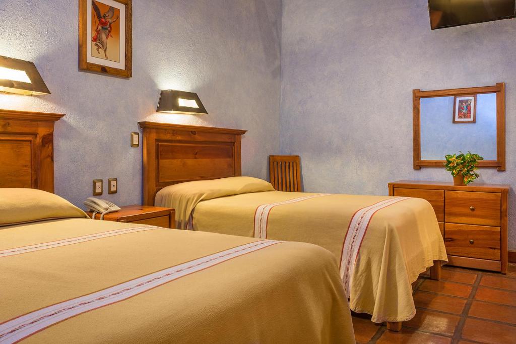 Hotel Refugio del Angel - Tap to explore photos