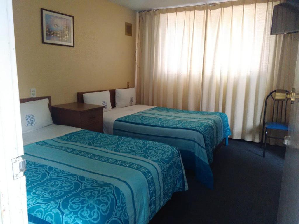 Двухместный (Двухместный номер с 2 двуспальными кроватями), Hotel Polly